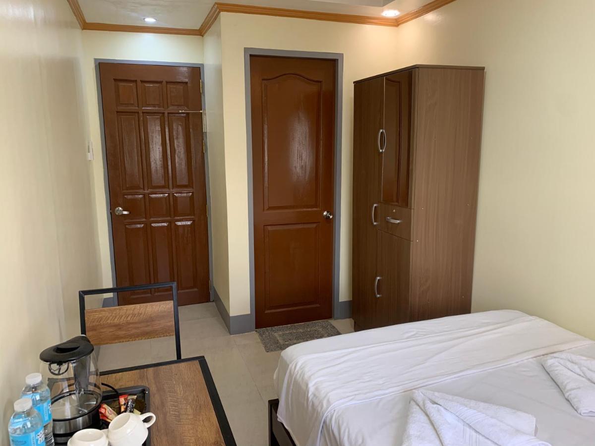 Zl Travelers Inn Batuan Екстериор снимка