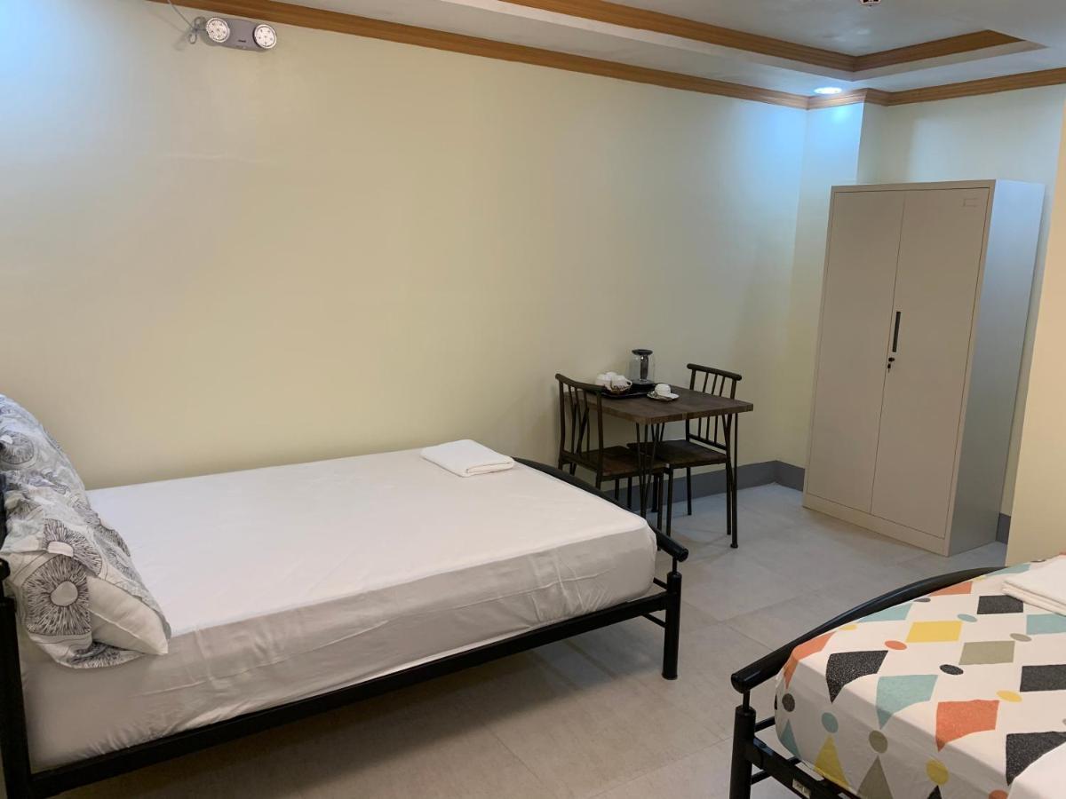 Zl Travelers Inn Batuan Екстериор снимка