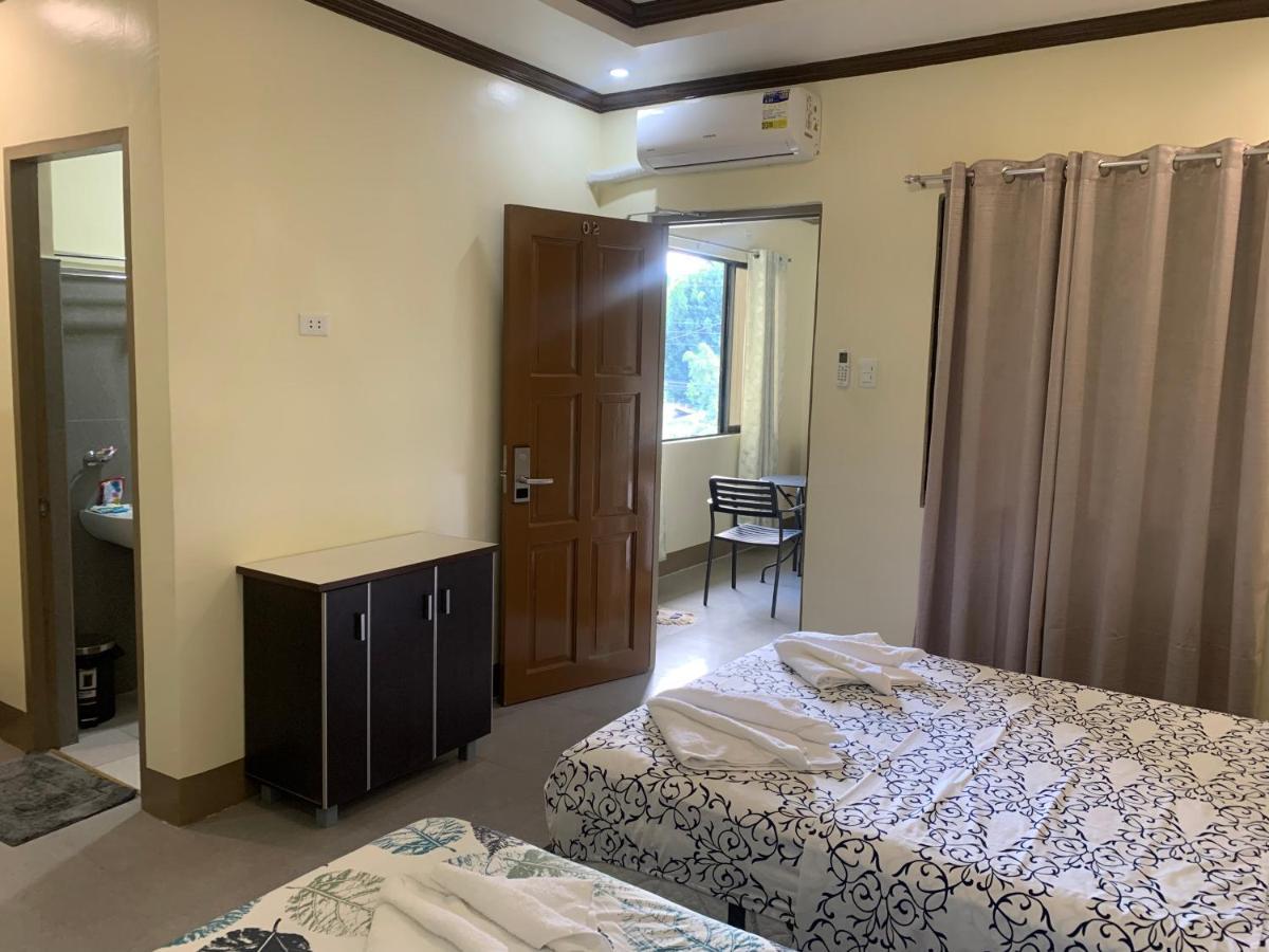 Zl Travelers Inn Batuan Екстериор снимка