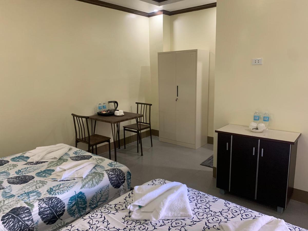 Zl Travelers Inn Batuan Екстериор снимка