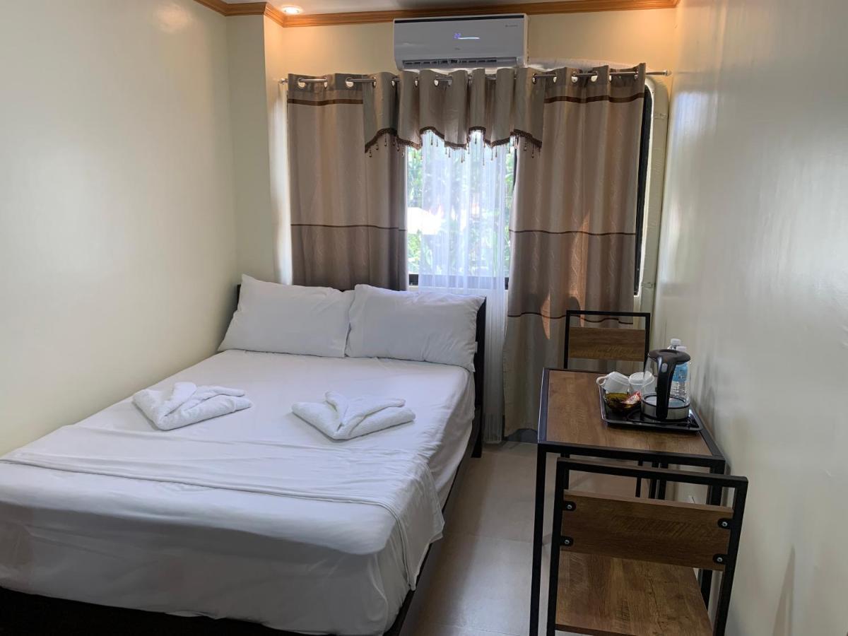 Zl Travelers Inn Batuan Екстериор снимка