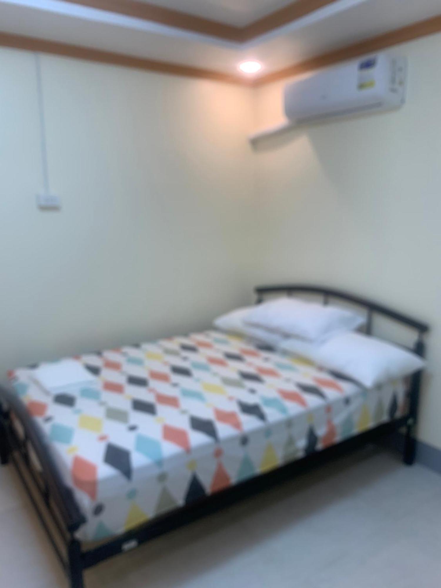 Zl Travelers Inn Batuan Екстериор снимка