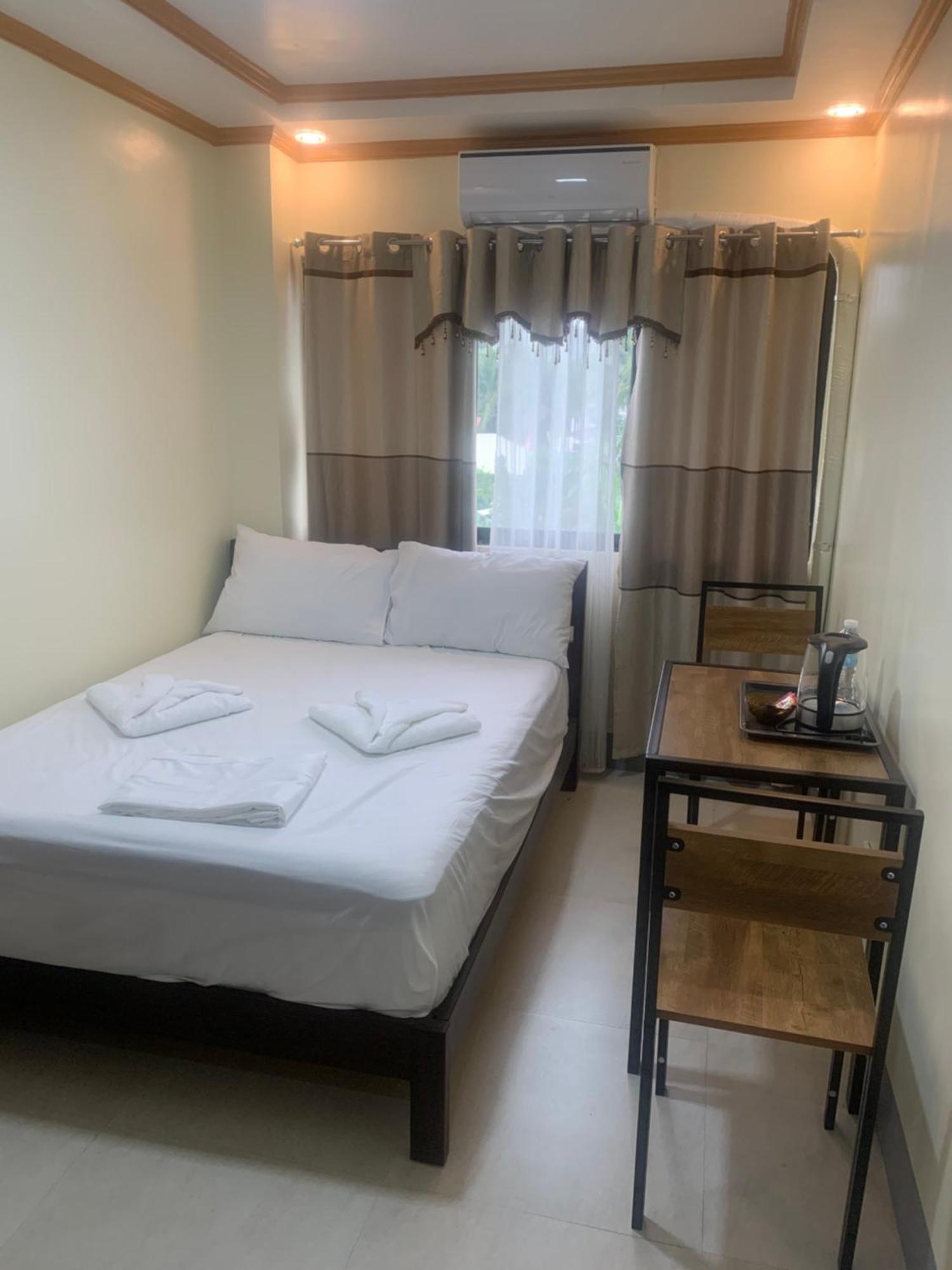 Zl Travelers Inn Batuan Екстериор снимка